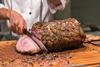 Carving roast beef joint