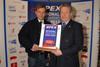 Charlie Shaw is awarded his title by BPEX's Keith Fisher.