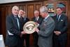 HRH The Prince of Wales receives the Royal Smithfield Club Bicentenary Trophy from John Coultrip (immediate past president of The Royal Smithfield Club). Behind – left to right: John Campbell (past club chairman), Julian Hopwood (Club chairman elect)…