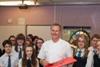 Chef Nick Nairn with pupils of Woodmill High School flanked by Jennifer Robertson, QMS Health and Education Coordinator, and Alex Mitchell, Fife Butcher.