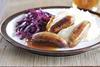 Pork and Garlic Sausages with Goats Cheese Mash and Red Cabbage Saute