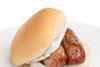 A grilled Cumberland sausage in a buttered plain white bap with ketchup and fried onions is the nation's favourite sausage sandwich.