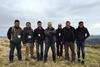 Paul Brown, Randall Parker Foods, and farmer Huw Tudor with the study group.