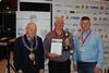 Mike Maloney (centre) with (left) NFMFT President Jim Sperring and Michael Rawsthorne of IFI Ingredients (sponsors)