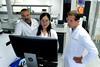 Vince Martin Dr Henna Lu and James Smith check lab results Andy Abbott