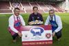 JambosÕ winger Sam Nicolson, prepares to tuck into a delicious Scotch Beef PGI roll to celebrate Heart of Midlothian Football Club becoming the first Scottish Premiership club to join Quality Meat ScotlandÕs Scotch Beef Club. Pic shows l to r: