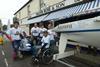 L to R: Rebekah Wilson, Paula Walker’s brake lady, John Jackson, Paula Walker (GB Ladies No. 1 bobsleigh pilot) and Steve Cook (partner in Walter Rose and Son). The chap at the front is Andrew Farrow, a disabled sailor that Walter Rose and Son have a…