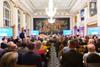 Audience watching panellists at the City Meat Lecture 2021 at Butchers Hall