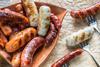 Sausages on forks