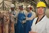 Jessica Bradley, human resources manager at Randall Parker Foods, with apprentices at the company’s Dolwen abattoir.