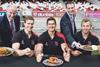 Jack Dobson, Dunbia executive director (l) and Matthew Dobson, Dunbia managing director, serve up beef dishes to Ulster Rugby players Andrew Trimble, Robbie Diack and Roger Wilson.