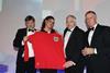 L-R: Professor Roger Kirby, representing the Urology Foundation with Fran White and Chris Price of Graham White & Co collecting their replica 1966 England shirt from Sir Geoff Hurst.