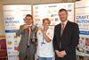 Helen Vaughan seen accepting the Supreme Award on behalf of Matthew Edwards with (left) Steve Derrick of Lucas Ingredients (Sponsor) and NFMFT President John Mettrick.