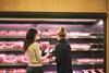 Shoppers Selecting Meat (Retail)