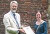 Dr Liesbet Pluym receives the UFAW Young Animal Welfare Scientist of the Year 2014 award from UFAW’s Chief Executive Dr Robert Hubrecht.