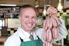 Butcher, Kevin Turner has created the world's most expensive sausage.