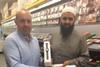 Yousuf Mulla from Mullaco Ltd being awarded with prize