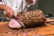 Carving roast beef joint