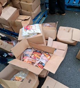 Suspected illegal food products being made ready for disposal by National Food Crime Unit