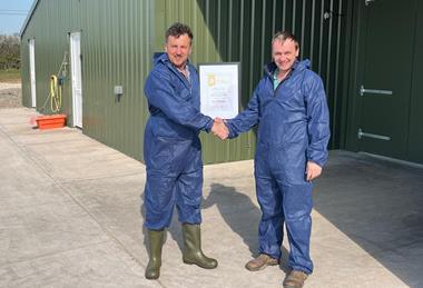 Farmer Ed Calcott and Pilgrim's Europe area manager Ben Vernon
