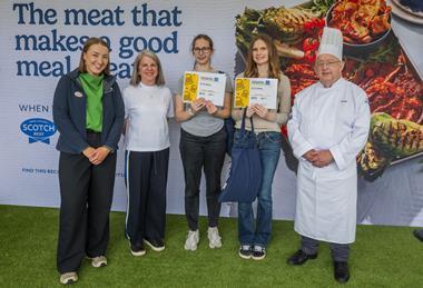 Global Burger Challenge Winners Zuzanna Lewandowska and Ellen Lauder are presented with their prizes