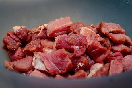 Raw meat in bowl