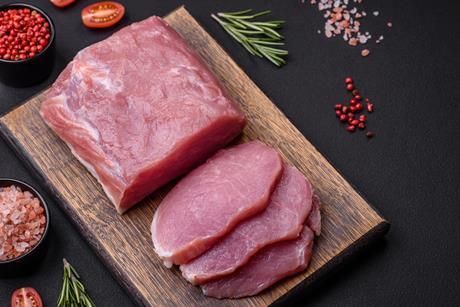 Raw pork on chopping board