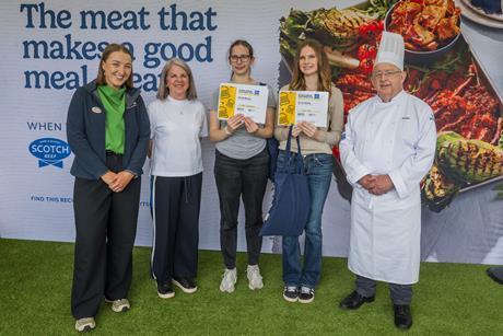 Global Burger Challenge Winners Zuzanna Lewandowska and Ellen Lauder are presented with their prizes