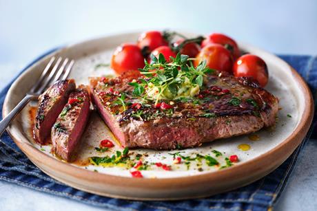 Steak with butter sliced