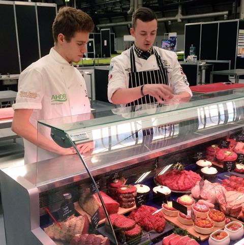 WorldSkills winner Peter Rushforth teaching Crosby Management Training trailblazer apprentice Stephen Maltby how to make a whole chicken cushion.