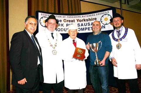 Supreme champion pork pie – Lee Scott of Keelham Farm Shop, Thornton, with (from left) Sat Lola, of sponsors William Jones Packaging, President of the Confederation of Yorkshire Butchers Councils Roy Dykes, trophy presenter Ted Jones, and President of the National Federation of Meat & Food Traders John Mettrick.