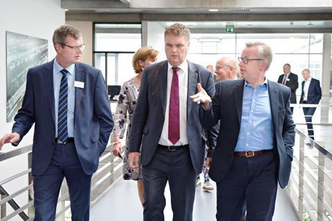 L r Eric Bredholt chairman Danish Crown Jais Valeur CEO Danish Crown Michael Gove MP Secretary of State Defra 