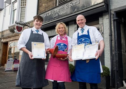 Fearghas Lowther, Louise Forsyth and Callum Forsyth of Forsyths Butchers and Bakers in Peebles with their award-winning Scotch Lamb Tagine and awards.