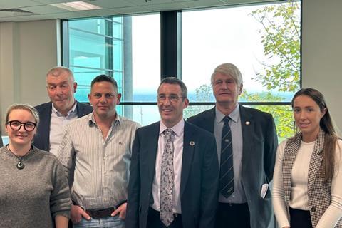 NSA representatives with Minister Andrew Muir