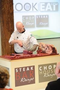 EBLEX's Martin Eccles puts a meat cleaver to proper use during a demonstration at the Tower of London!