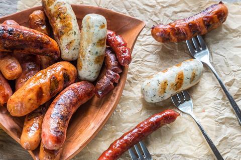 Sausages on forks