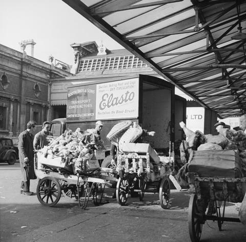 Unloading meat and poultry at Smithfield Market 20th century 