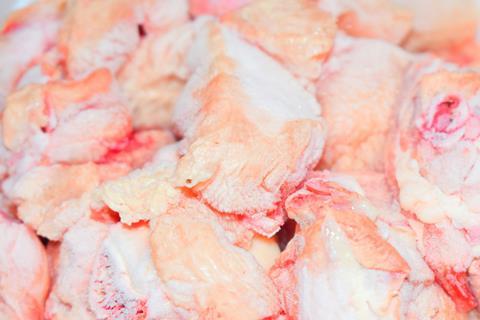 Raw frozen chicken pieces Unsplash cropped