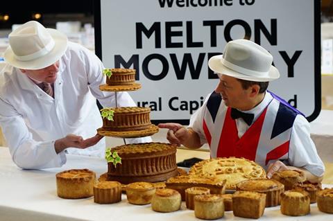 PIE BRITAIN IMAGE 3 British Pie Award event organiser Stephen Hallam and head judge Ian Nelson inspect some of the entries to this year’s Awards. Contact philippa.snell@wildwestcomms.co .uk  