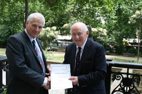 David Evans receives the Temperton Fellowship award from chairman Peel Holroyd. 