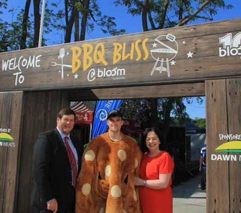 Paul Nolan, Dawn Meats and Marian Carroll, RMCH next to one of the BBQ mascots on the Dawn Meats-sponsored BBQ Bliss stand at the Bloom 2016 festival. Paul presented a cheque for €2,000 to Ronald McDonald House, from funds raised from 2,000 farmers who attended the recent Newford Farm Open Day