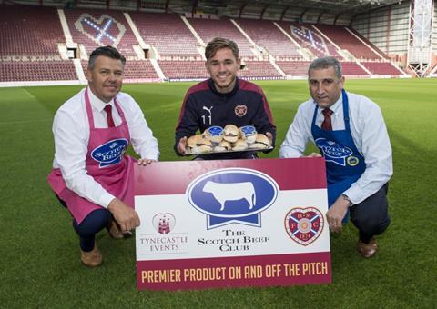 JambosÕ winger Sam Nicolson, prepares to tuck into a delicious Scotch Beef PGI roll to celebrate Heart of Midlothian Football Club becoming the first Scottish Premiership club to join Quality Meat ScotlandÕs Scotch Beef Club. Pic shows l to r: