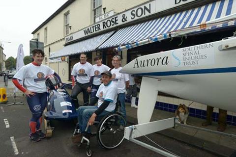 L to R: Rebekah Wilson, Paula Walker’s brake lady, John Jackson, Paula Walker (GB Ladies No. 1 bobsleigh pilot) and Steve Cook (partner in Walter Rose and Son). The chap at the front is Andrew Farrow, a disabled sailor that Walter Rose and Son have also sponsored. Pictures by Tom Dryden-Kelsey.