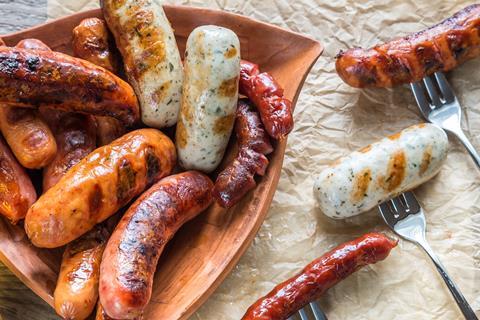 Sausages on forks