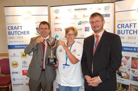 Helen Vaughan seen accepting the Supreme Award on behalf of Matthew Edwards with (left) Steve Derrick of Lucas Ingredients (Sponsor) and NFMFT President John Mettrick. 