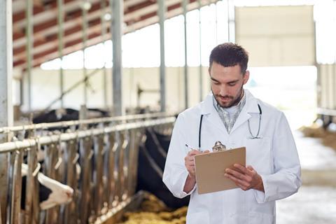 Vet with clipboard