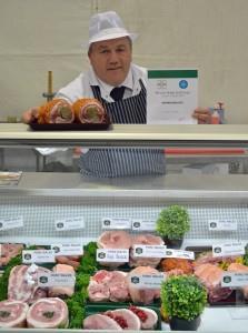 Welsh Pork Butcher champion Clinton Roberts with his winning display.