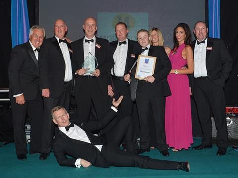 Morrisons was handed the Retailer of the Year trophy by stand-up and television comedian Patrick Kielty (lying down), and Paul Kelly, chair of the British Turkey Federation (far left).