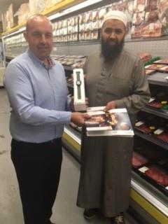 Yousuf Mulla from Mullaco Ltd being awarded with prize